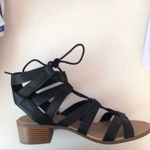 Black heeled strapped sandals